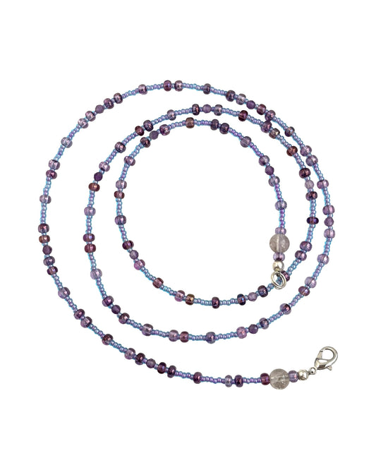 Purple beaded waistbead on a white background